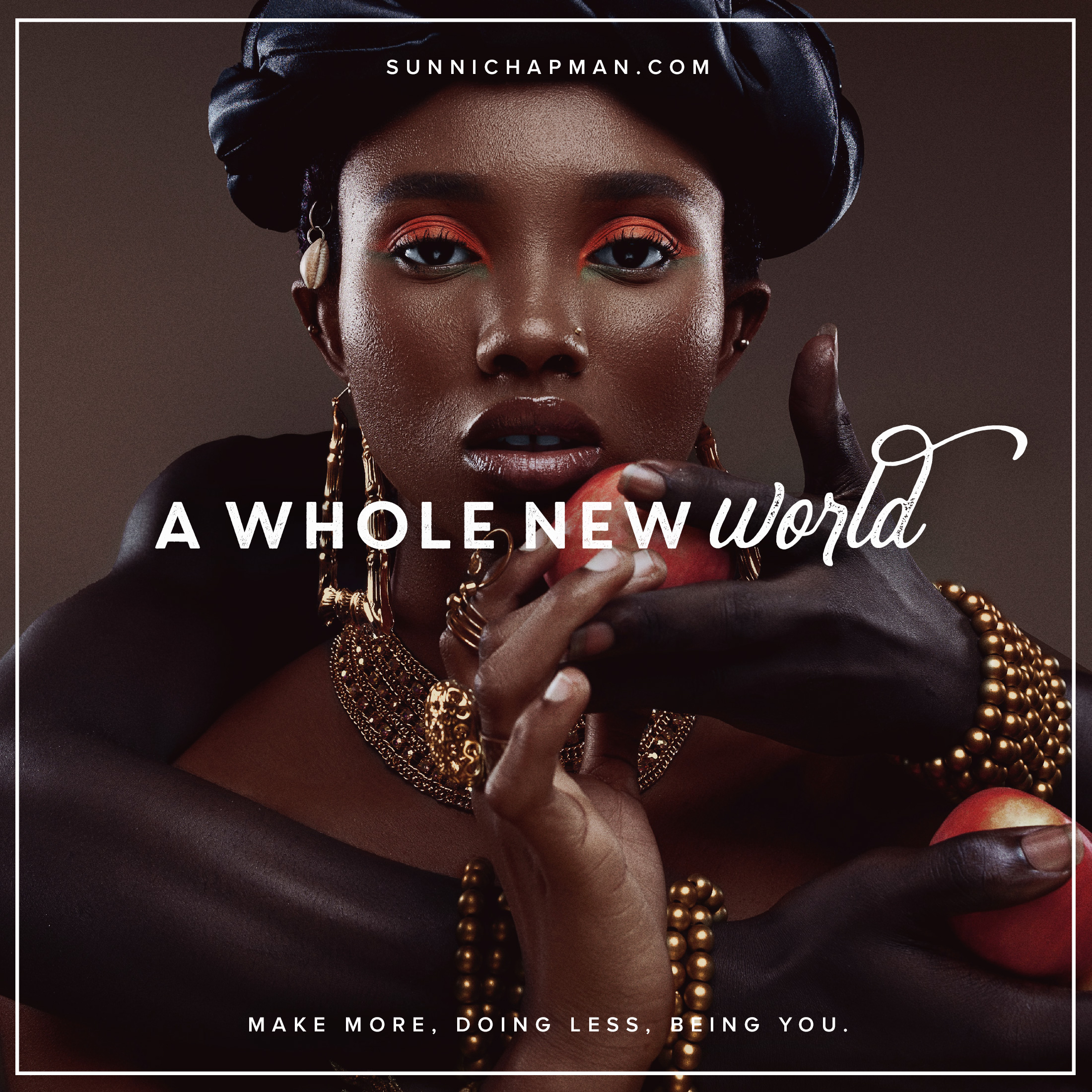 Stunning Afro-American woman with gold jewelry, holding apple and text over the image A Whole New World
