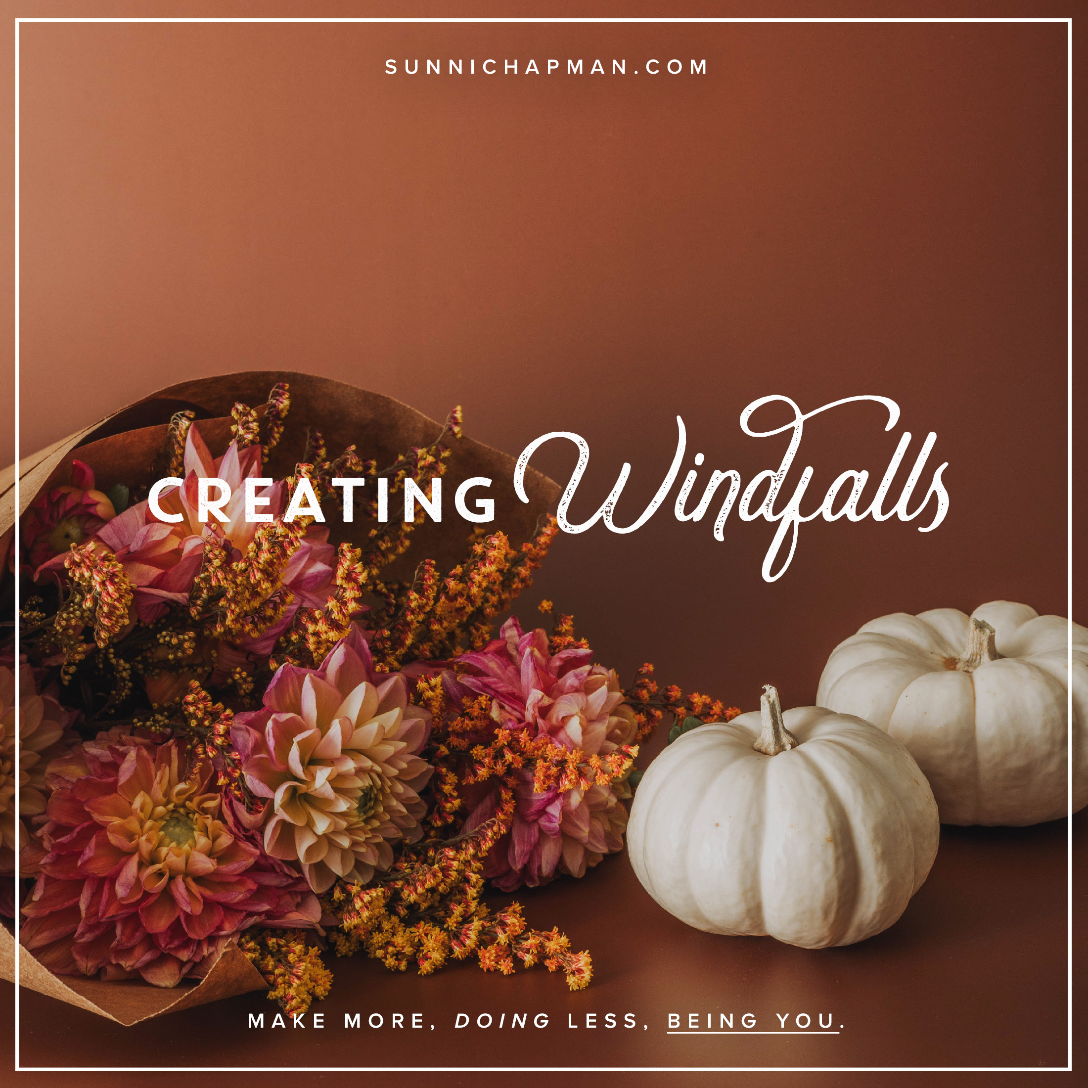 Beautiful dry flowers in varying shades of pink and orange alongside two pumpkins, with the text 'Creating Windfalls' displayed prominently.